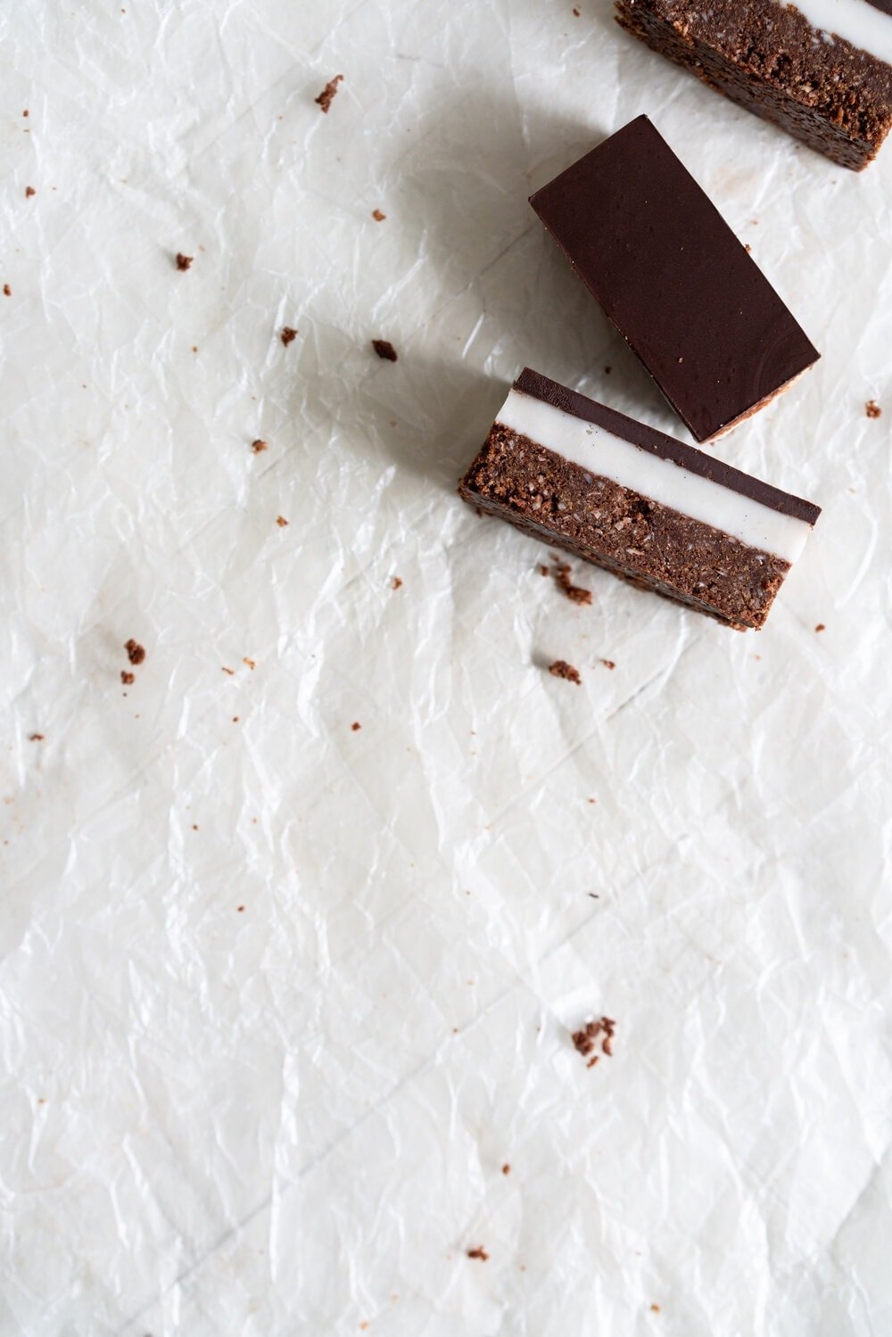 no-bake peppermint slice on parchment paper
