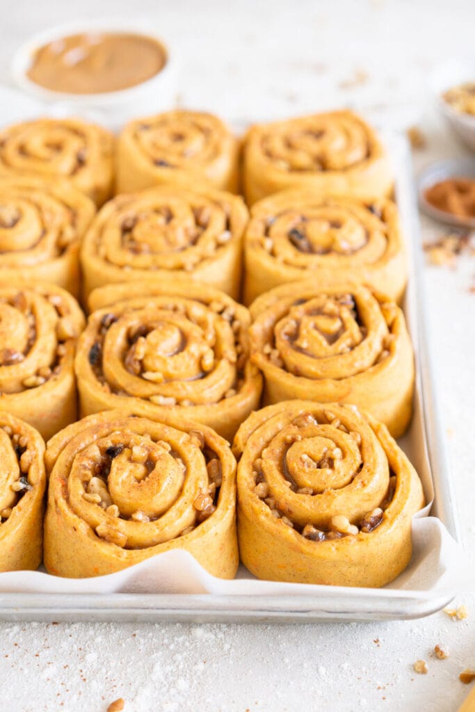 side on shot of carrot cake cinnamon rolls