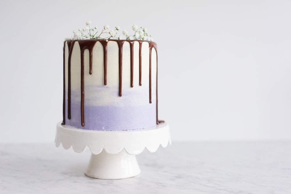 Honey lavender cake with vanilla german buttercream and lavender milk chocolate ganache drip