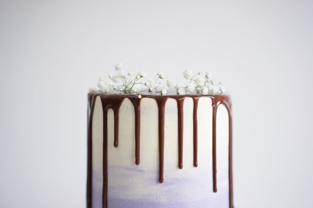 Honey lavender cake with vanilla german buttercream and lavender chocolate ganache drip