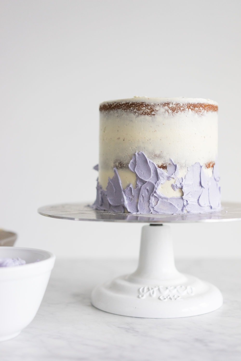 Honey lavender cake with vanilla german buttercream and lavender chocolate ganache drip
