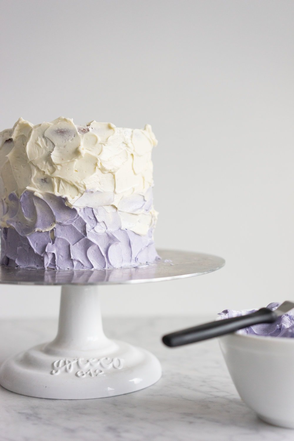 Honey lavender cake with vanilla german buttercream and lavender chocolate ganache drip