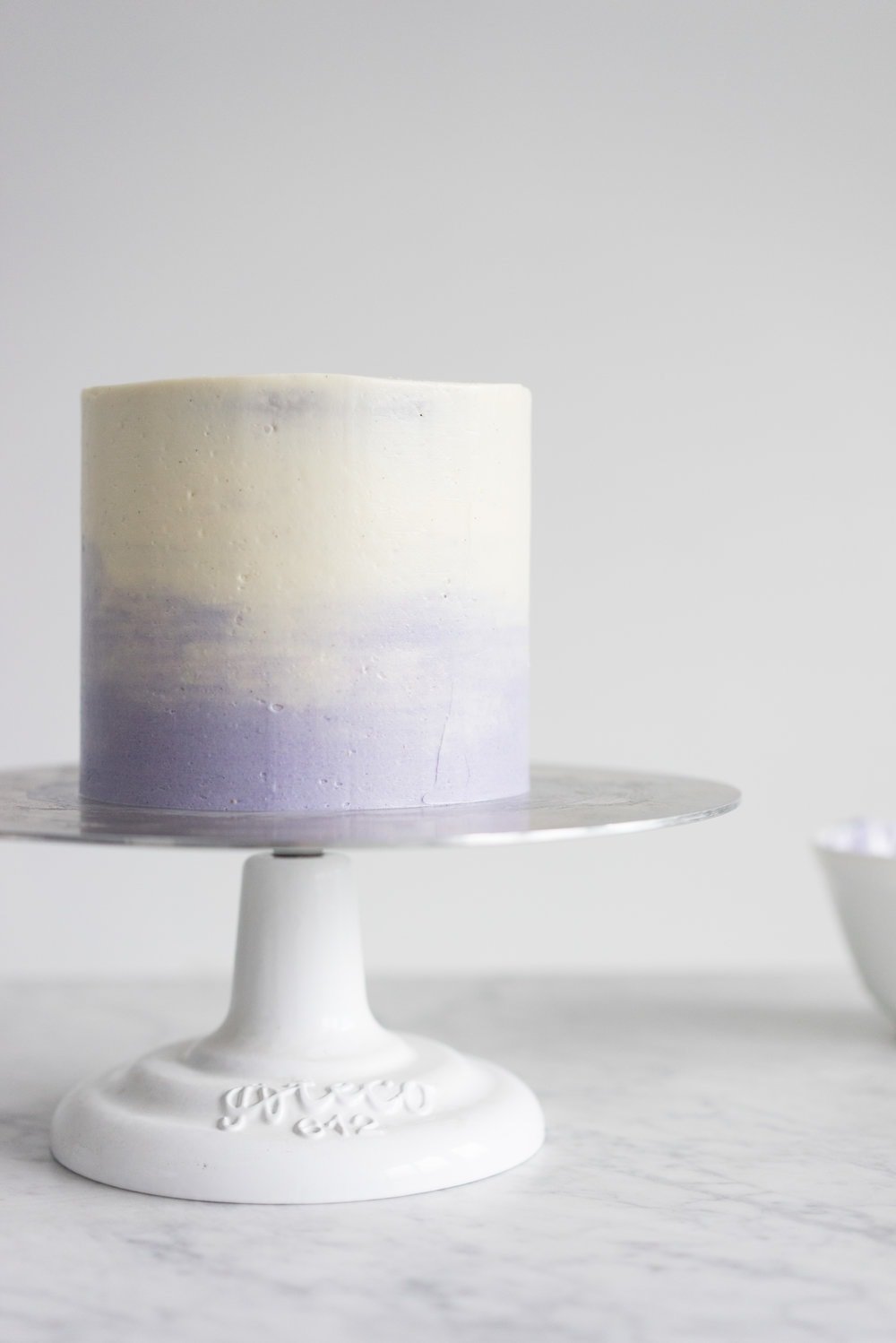 Honey lavender cake with vanilla german buttercream and lavender chocolate ganache drip