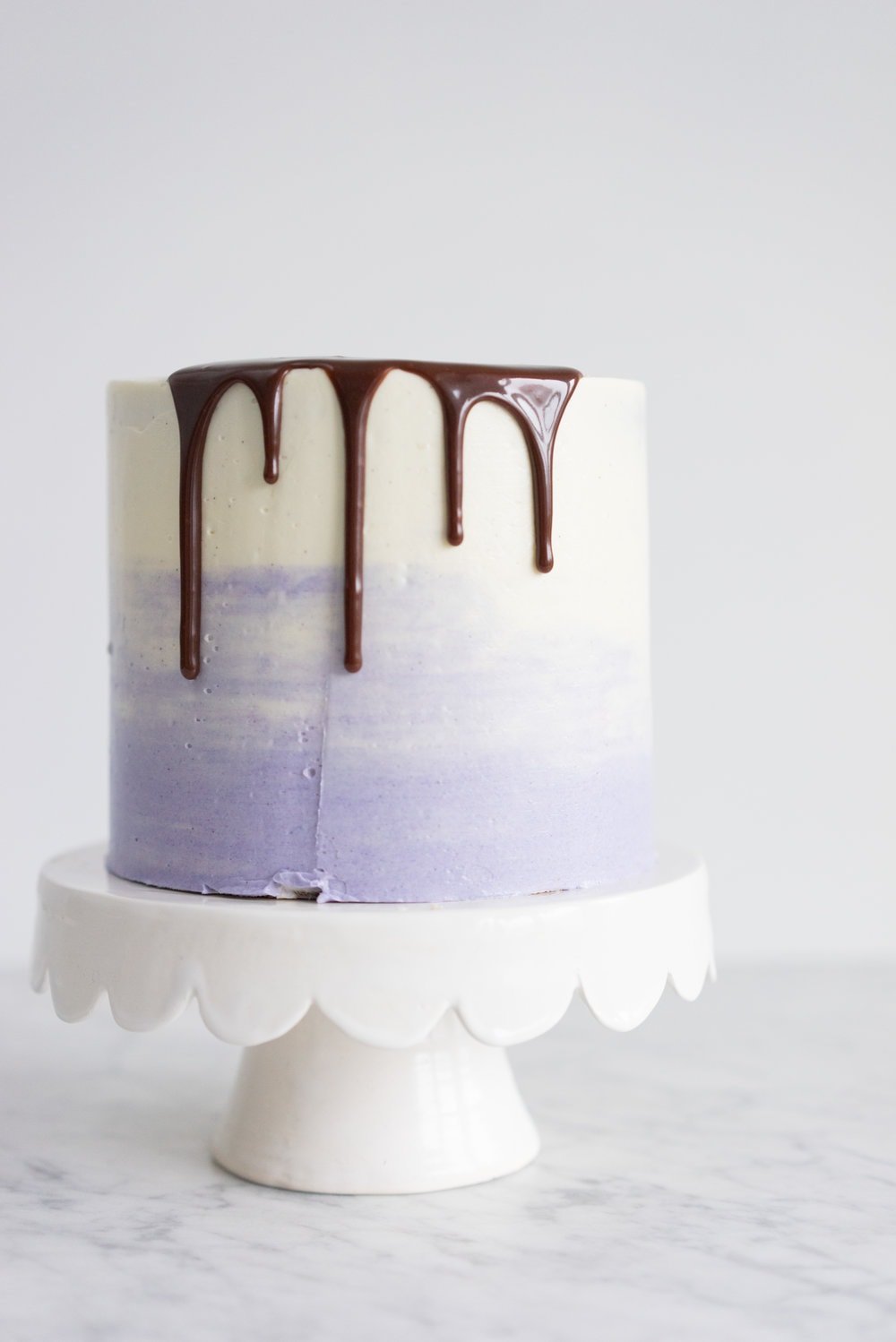 Honey lavender cake with vanilla german buttercream and lavender chocolate ganache drip