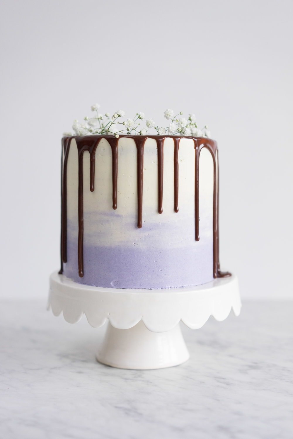 Honey lavender cake with vanilla german buttercream and lavender chocolate ganache drip