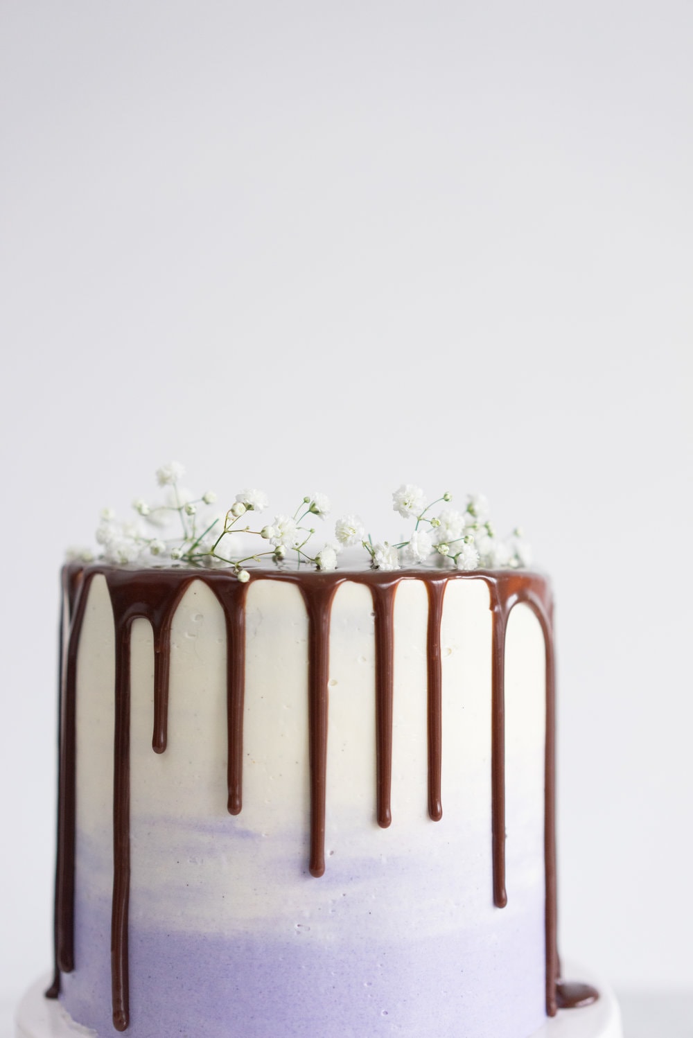 Honey lavender cake with vanilla german buttercream and lavender chocolate ganache drip