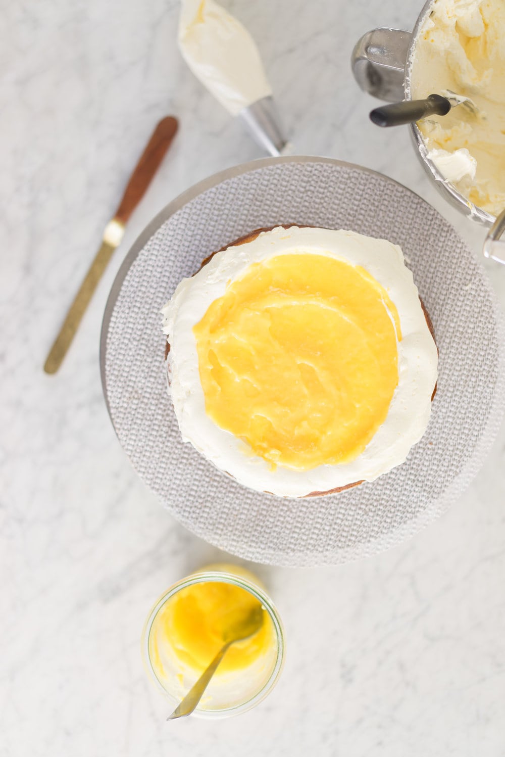 Zesty lemon yoghurt cake, lemon curd, and lemon curd swiss meringue buttercream