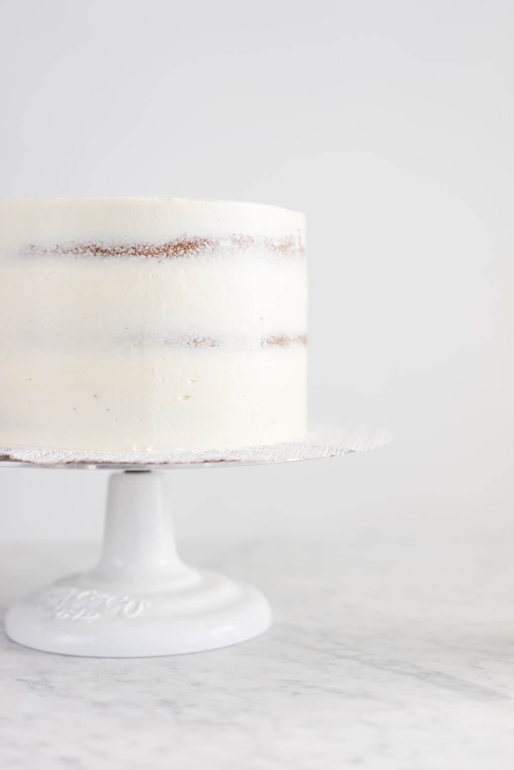 Zesty lemon yoghurt cake, lemon curd, and lemon curd swiss meringue buttercream