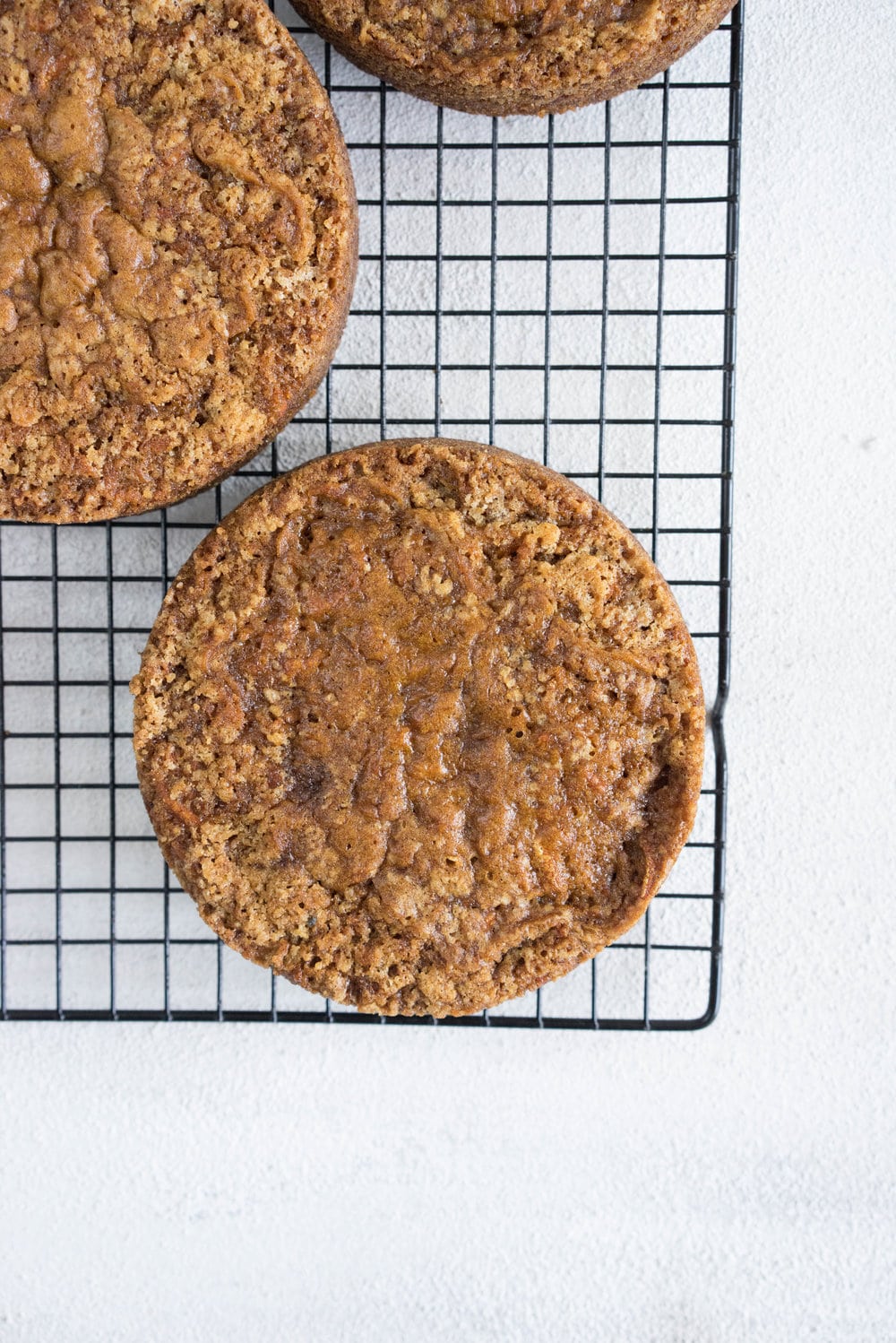 Carrot Cake with cream cheese icing that is super easy to pipe. The cake is moist and flavourful, and the icing has the perfect amount of sweetness and cream cheese punch.