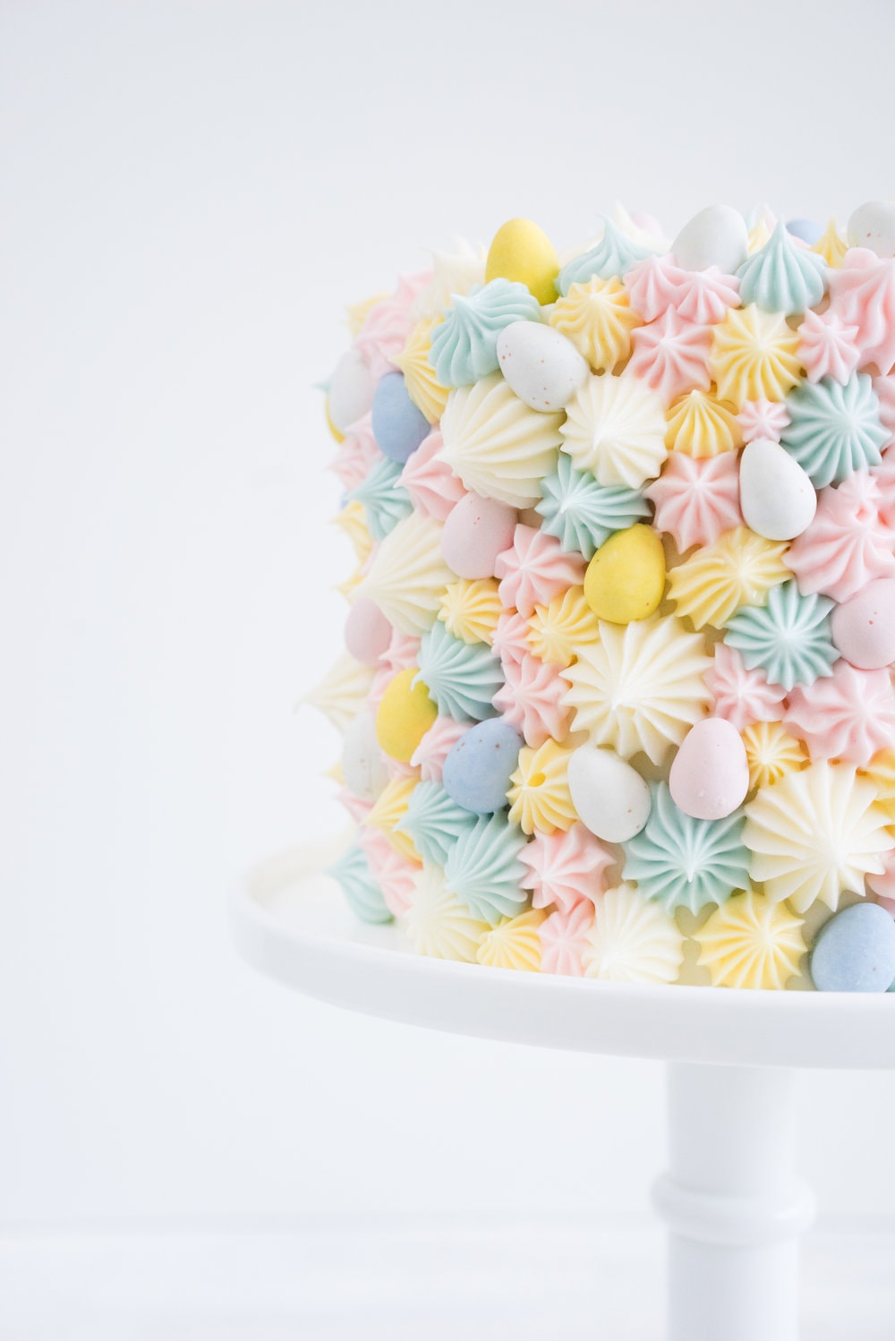 Carrot Cake with cream cheese icing that is super easy to pipe. The cake is moist and flavourful, and the icing has the perfect amount of sweetness and cream cheese punch.