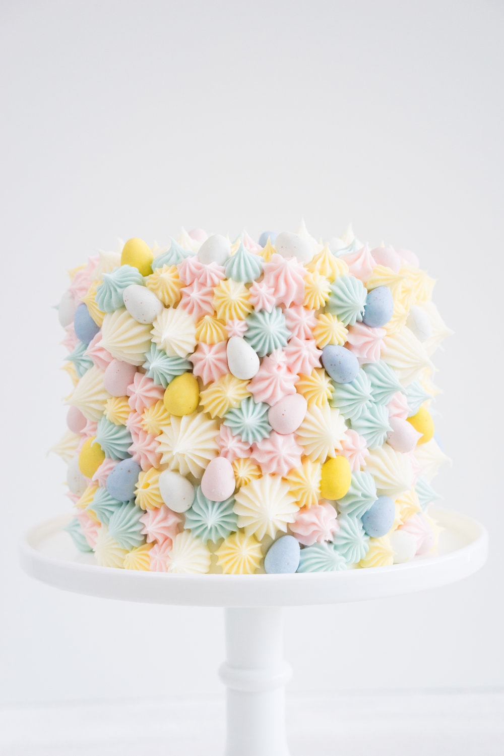 Carrot Cake with cream cheese icing that is super easy to pipe. The cake is moist and flavourful, and the icing has the perfect amount of sweetness and cream cheese punch.