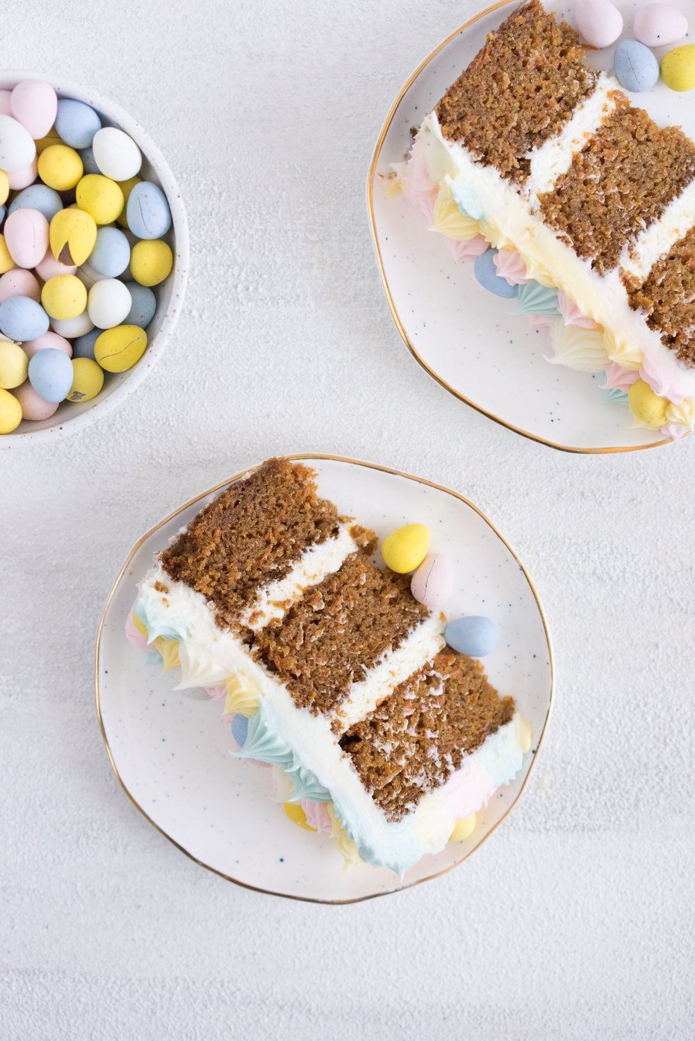 Carrot Cake with cream cheese icing that is super easy to pipe. The cake is moist and flavourful, and the icing has the perfect amount of sweetness and cream cheese punch.