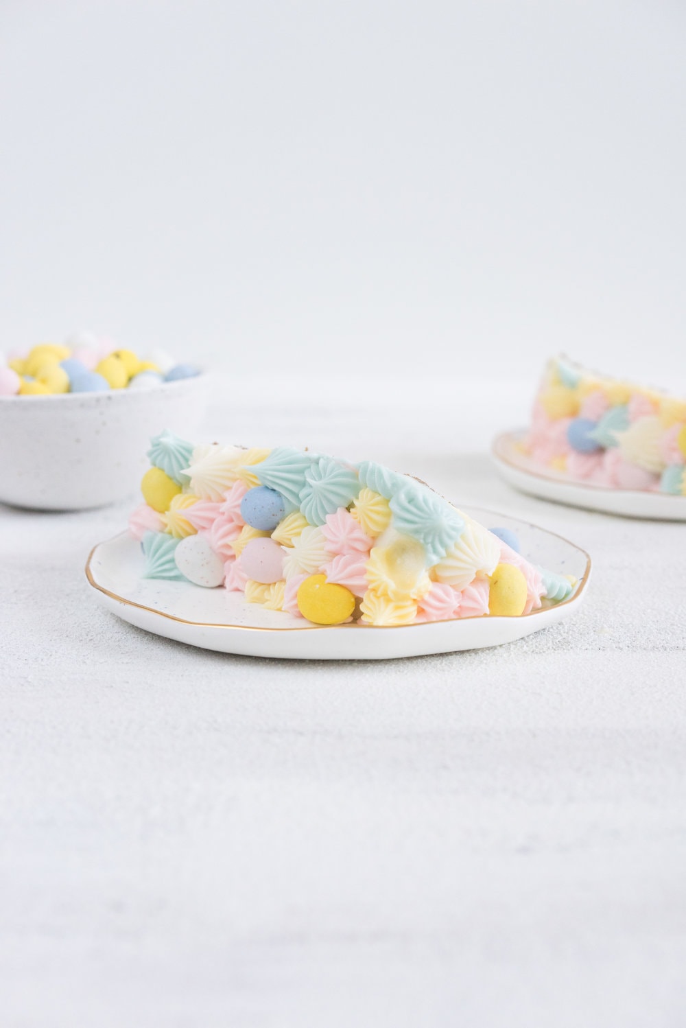 Carrot Cake with cream cheese icing that is super easy to pipe. The cake is moist and flavourful, and the icing has the perfect amount of sweetness and cream cheese punch.