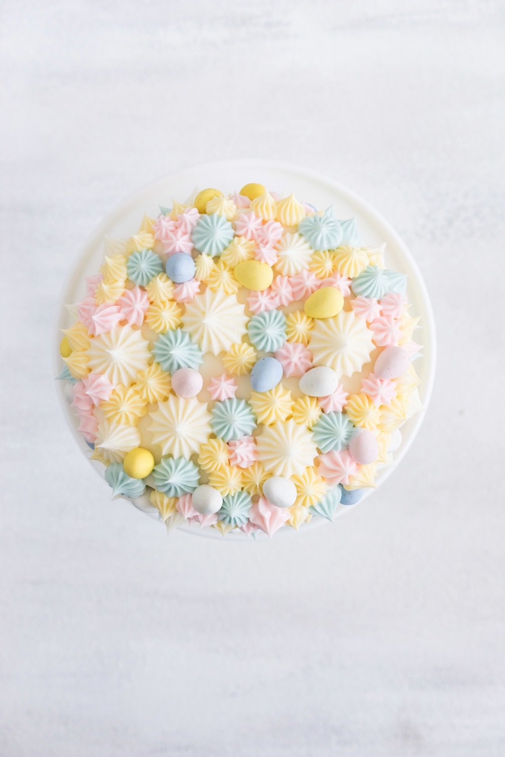 Carrot Cake with cream cheese icing that is super easy to pipe. The cake is moist and flavourful, and the icing has the perfect amount of sweetness and cream cheese punch.