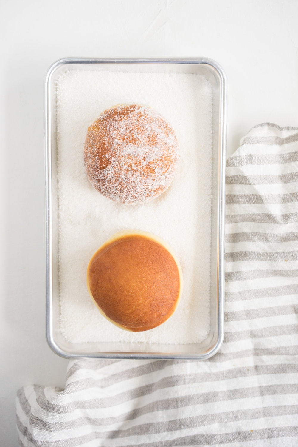 Brioche doughnuts, roasted rhubarb, vanilla bean pastry cream, and vanilla sugar
