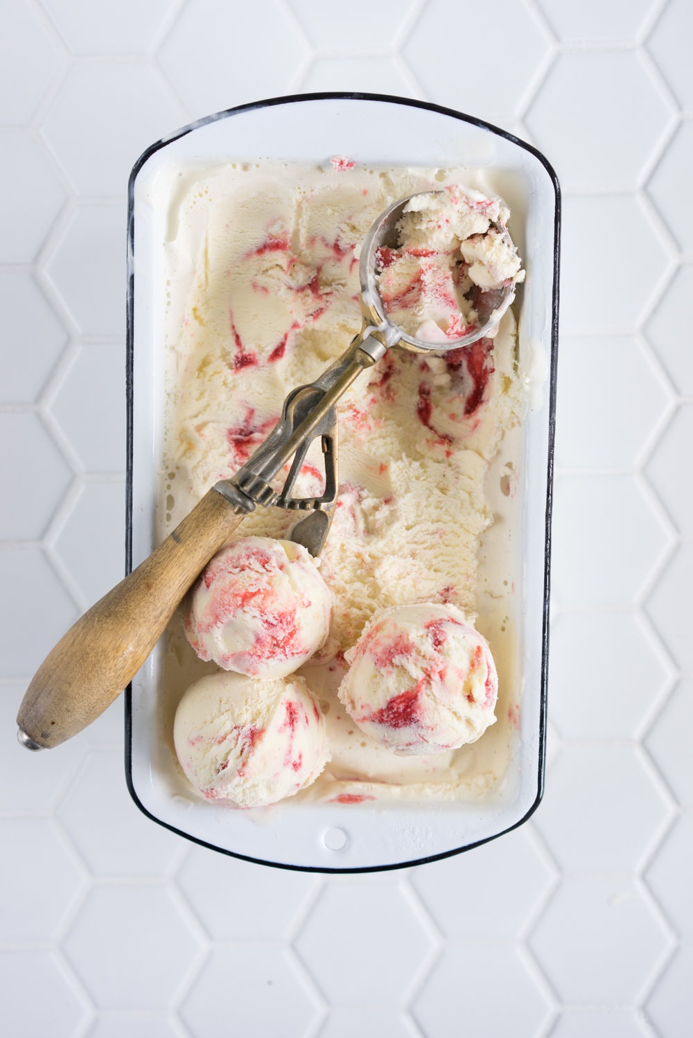 Strawberry ripple and shortbread ice cream - creamy vanilla ice cream, swirled with fresh strawberry sauce, and studded with chunks of home made shortbread