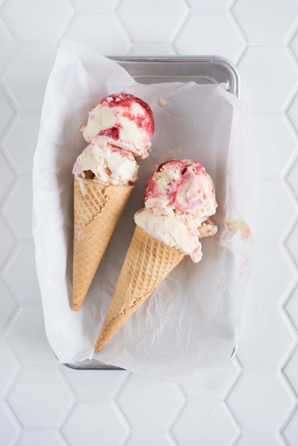 Strawberry ripple and shortbread ice cream - creamy vanilla ice cream, swirled with fresh strawberry sauce, and studded with chunks of home made shortbread