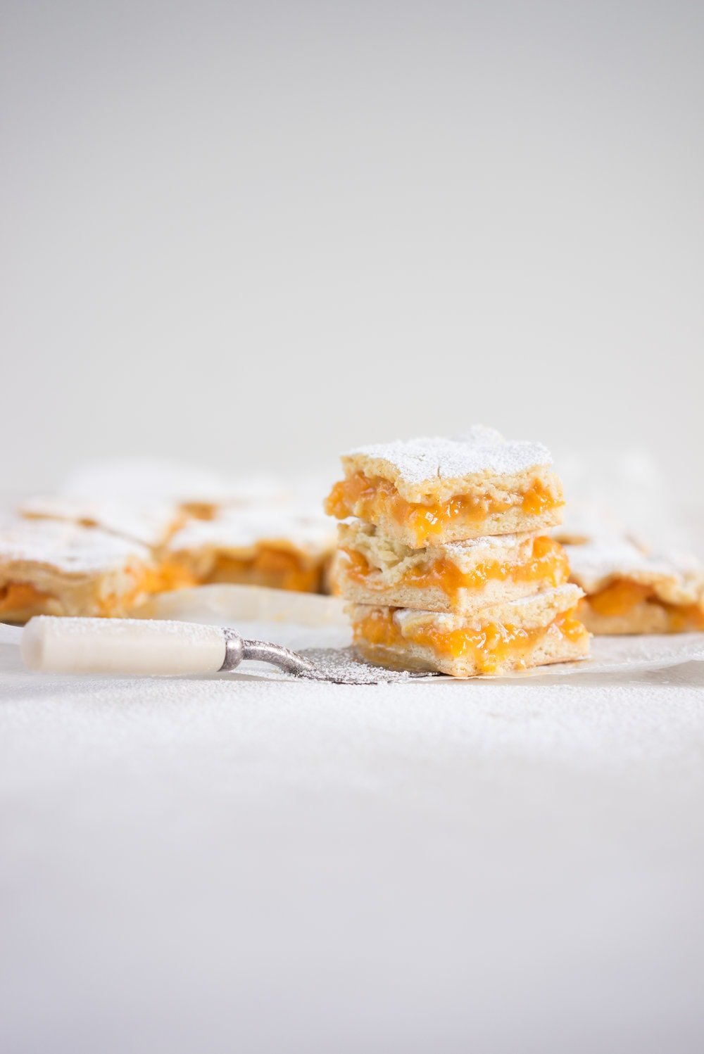 Apricot shortcake - a thick layer of apricot, lightly sweetened with honey, encased between layers of vanilla shortbread pastry. A classic favourite - perfect for a morning or afternoon tea. Super versatile, can be replicated with apple, pear, rhubarb etc