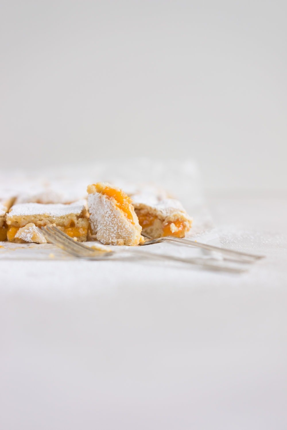 Apricot shortcake - a thick layer of apricot, lightly sweetened with honey, encased between layers of vanilla shortbread pastry. A classic favourite - perfect for a morning or afternoon tea. Super versatile, can be replicated with apple, pear, rhubarb etc
