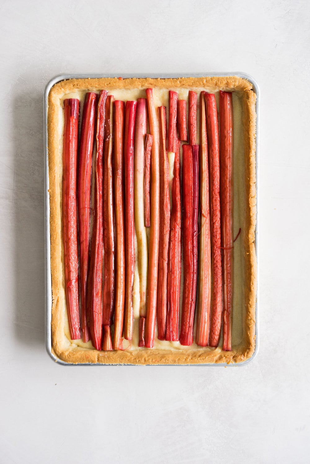 Brown butter rhubarb streusel tart - pate sucree, brown butter frangipane, cured rhubarb, and toasted almond streusel. Worth every second