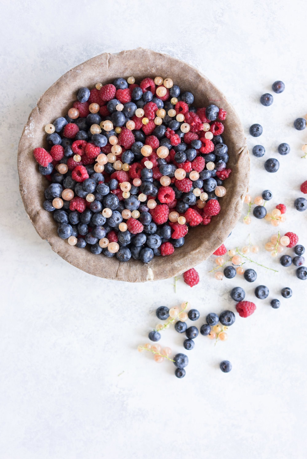 Blueberry, raspberry and white currant pie with buckwheat crust - the perfect 4th of july pie, or change the lattice up and you have the perfect summer dessert!