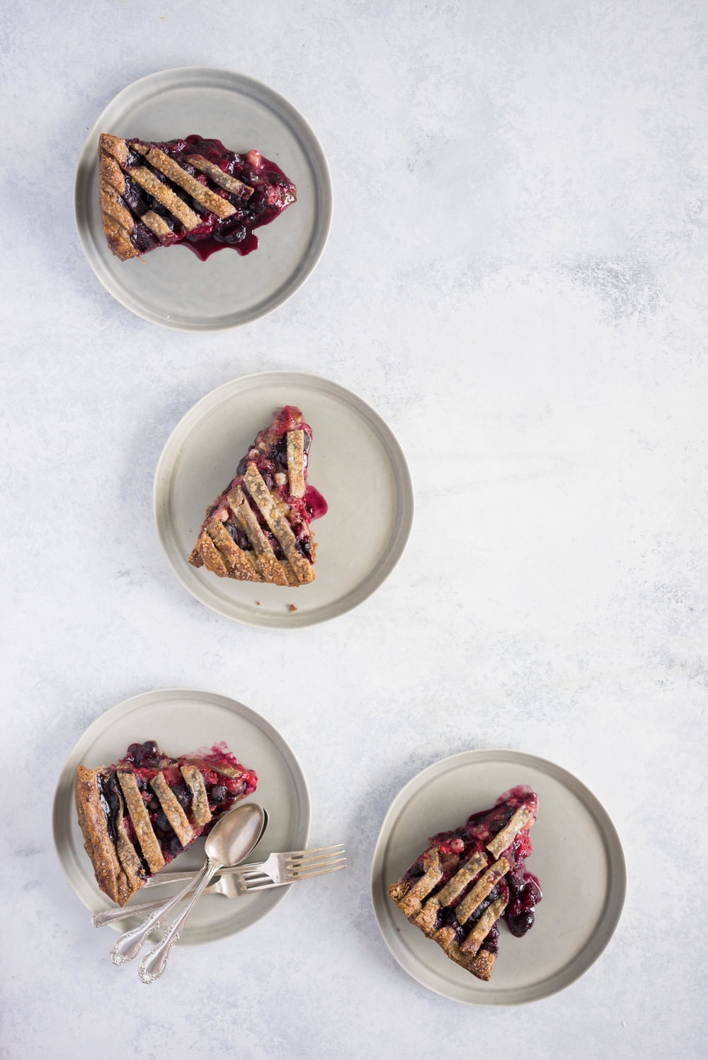 Blueberry, raspberry and white currant pie with buckwheat crust - the perfect 4th of july pie, or change the lattice up and you have the perfect summer dessert!