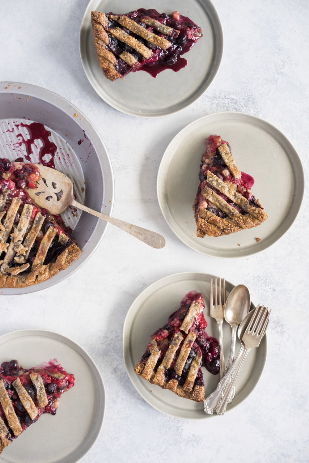 Blueberry, raspberry and white currant pie with buckwheat crust - the perfect 4th of july pie, or change the lattice up and you have the perfect summer dessert!