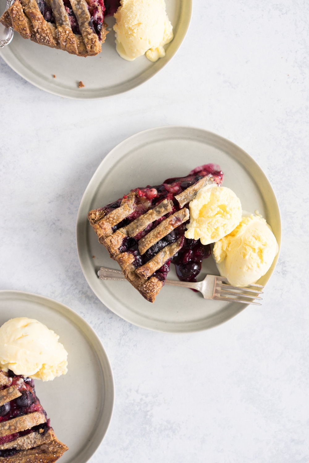 Blueberry, raspberry and white currant pie with buckwheat crust - the perfect 4th of july pie, or change the lattice up and you have the perfect summer dessert!