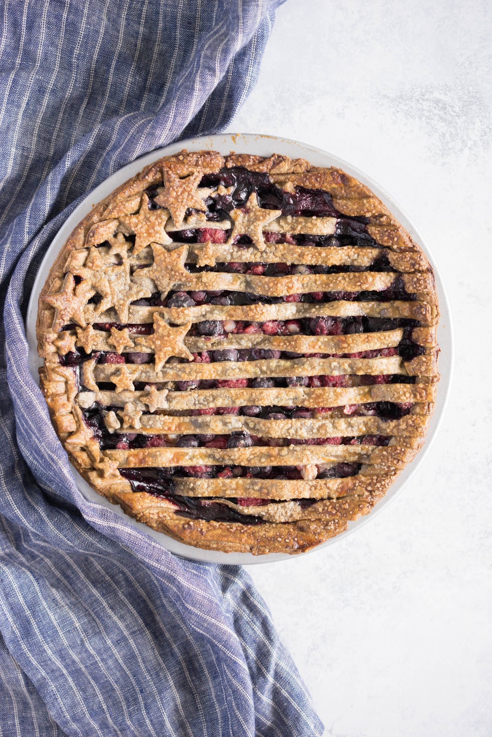 Blueberry, raspberry and white currant pie with buckwheat crust - the perfect 4th of july pie, or change the lattice up and you have the perfect summer dessert!