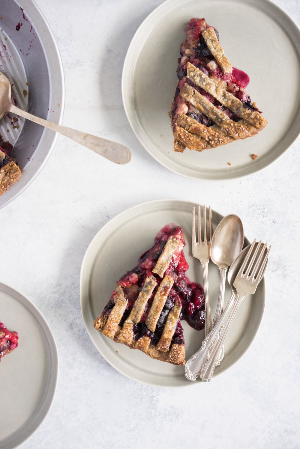 Blueberry, raspberry and white currant pie with buckwheat crust - the perfect 4th of july pie, or change the lattice up and you have the perfect summer dessert!