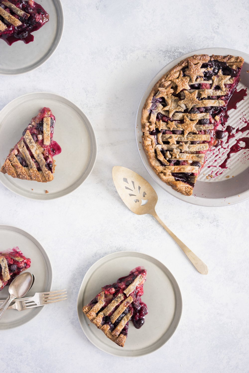 Blueberry, raspberry and white currant pie with buckwheat crust - the perfect 4th of july pie, or change the lattice up and you have the perfect summer dessert!