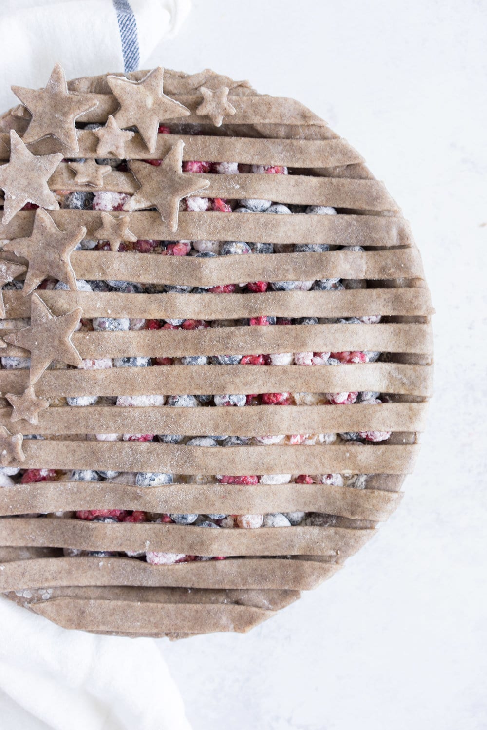 Blueberry, raspberry and white currant pie with buckwheat crust - the perfect 4th of july pie, or change the lattice up and you have the perfect summer dessert!