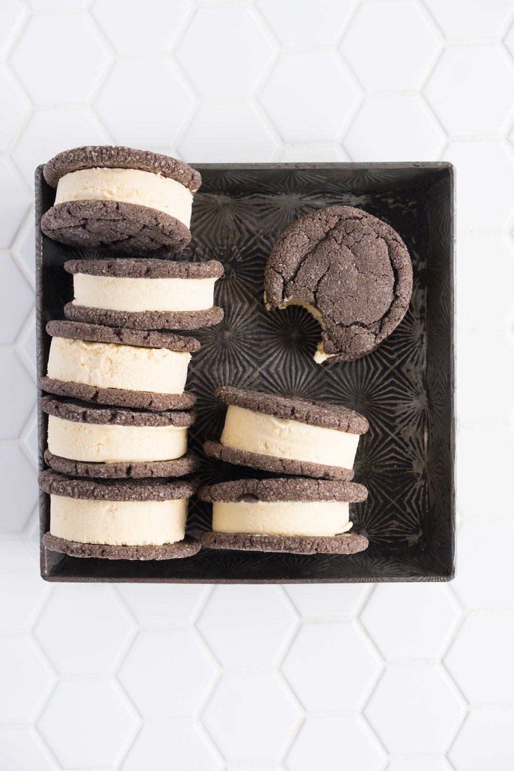 Chocolate earl grey ice cream sandwiches - creamy earl grey ice cream sandwiched between perfectly chewy chocolate sugar cookies. The dessert you never knew you needed. Until now.