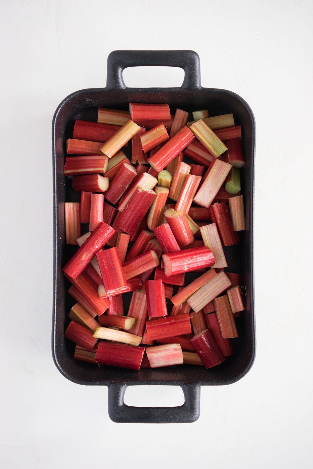 Rhubarb almond crumble with kaffir lime ice cream - the perfect way to hero rhubarb. A super simple summer dessert that can easily be adapted to use your favourite fruit. Paired with a delicately flavoured kaffir lime ice cream, this is the ultimate comfort food.