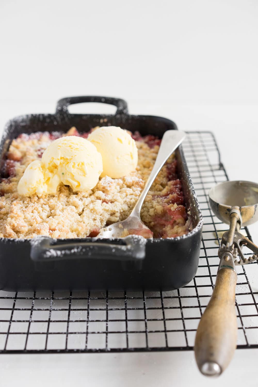 Rhubarb almond crumble with kaffir lime ice cream - the perfect way to hero rhubarb. A super simple summer dessert that can easily be adapted to use your favourite fruit. Paired with a delicately flavoured kaffir lime ice cream, this is the ultimate comfort food.