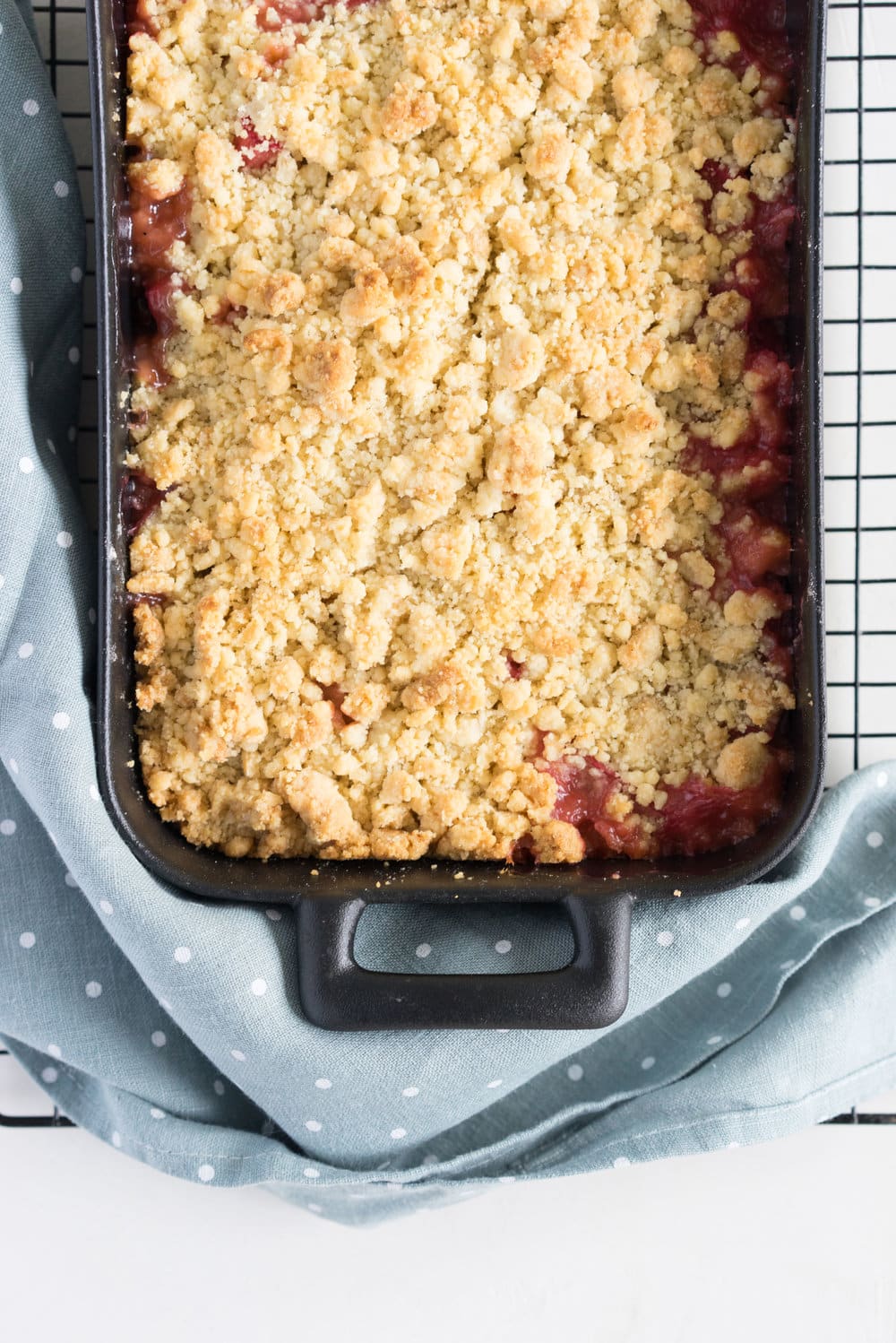 Rhubarb almond crumble with kaffir lime ice cream - the perfect way to hero rhubarb. A super simple summer dessert that can easily be adapted to use your favourite fruit. Paired with a delicately flavoured kaffir lime ice cream, this is the ultimate comfort food.