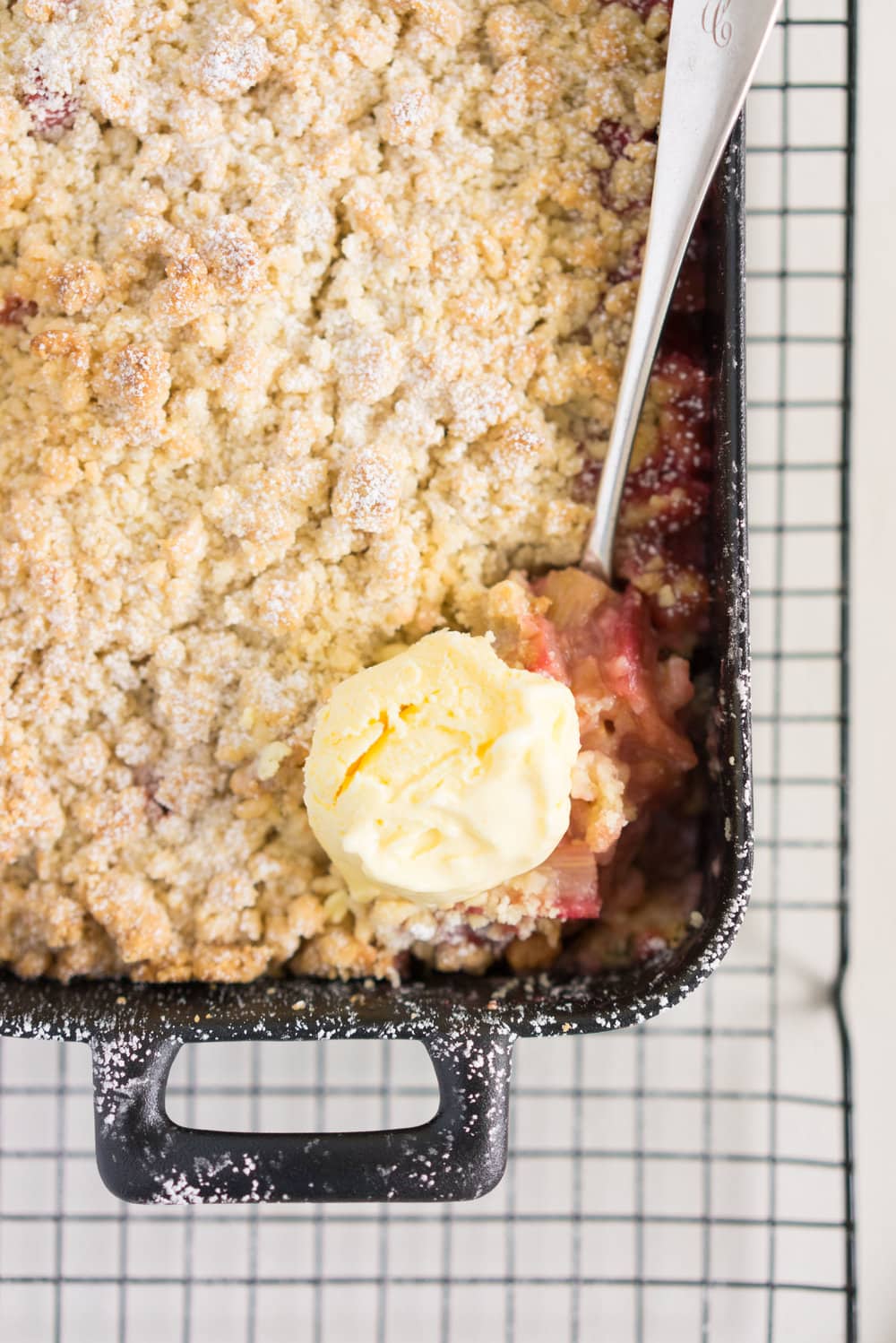 Rhubarb almond crumble with kaffir lime ice cream - the perfect way to hero rhubarb. A super simple summer dessert that can easily be adapted to use your favourite fruit. Paired with a delicately flavoured kaffir lime ice cream, this is the ultimate comfort food.