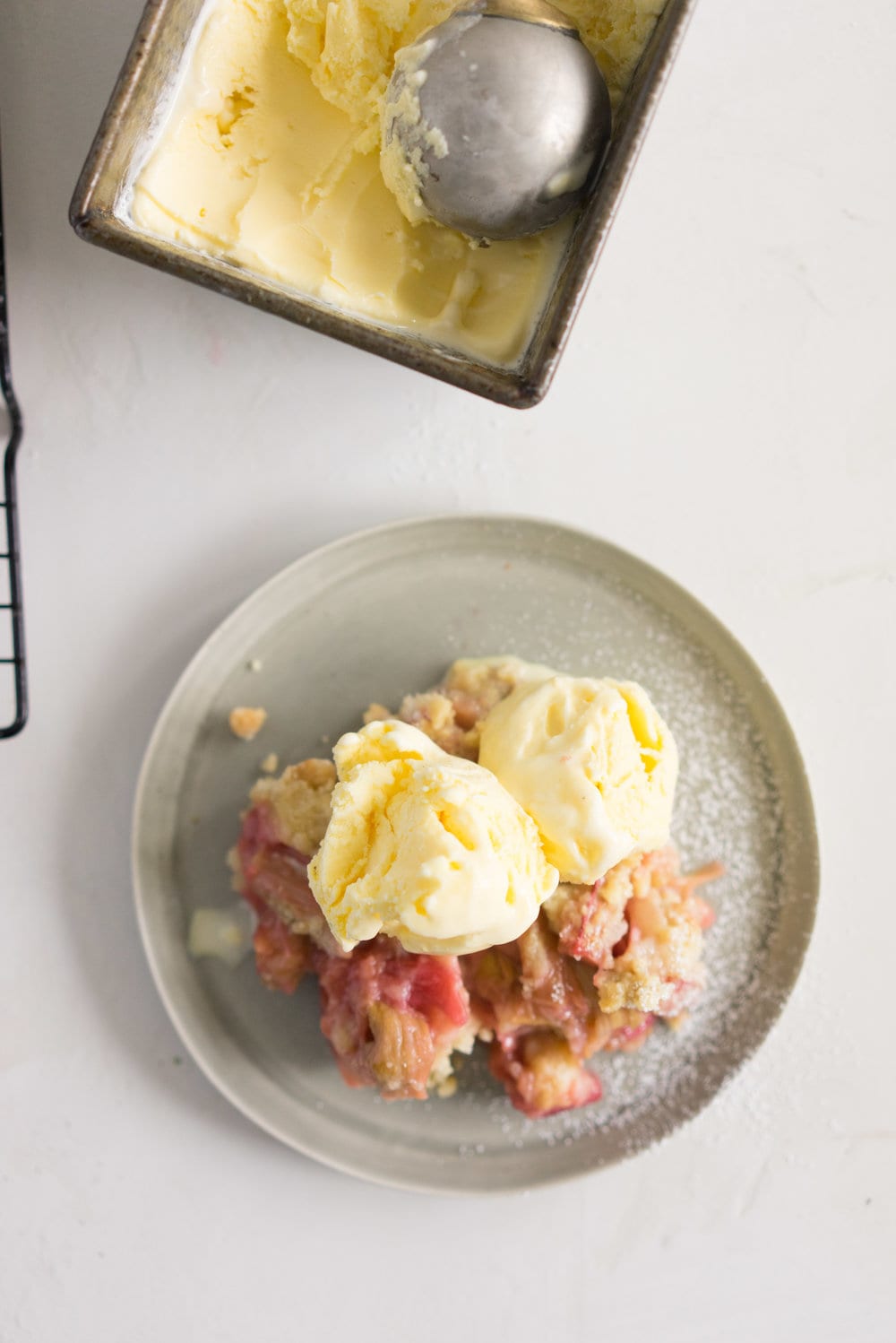 Rhubarb almond crumble with kaffir lime ice cream - the perfect way to hero rhubarb. A super simple summer dessert that can easily be adapted to use your favourite fruit. Paired with a delicately flavoured kaffir lime ice cream, this is the ultimate comfort food.