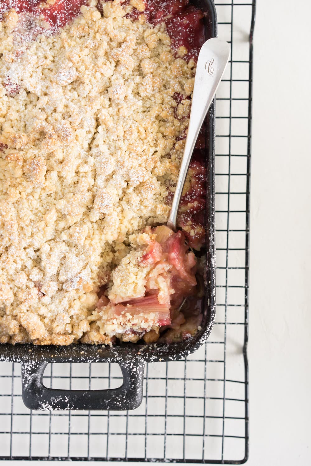 Rhubarb almond crumble with kaffir lime ice cream - the perfect way to hero rhubarb. A super simple summer dessert that can easily be adapted to use your favourite fruit. Paired with a delicately flavoured kaffir lime ice cream, this is the ultimate comfort food.