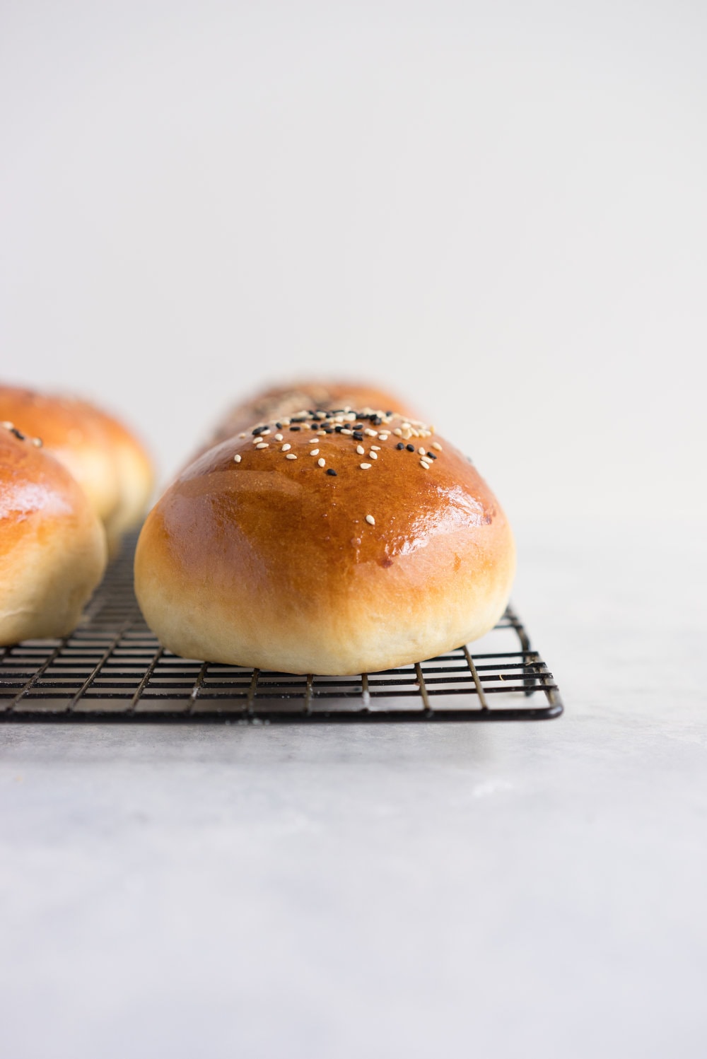 Black bean burgers with homemade brioche burger buns - the perfect vegetarian meal that even the staunchest of hamburger eater will love! #vegetarian #blackbeanburger
