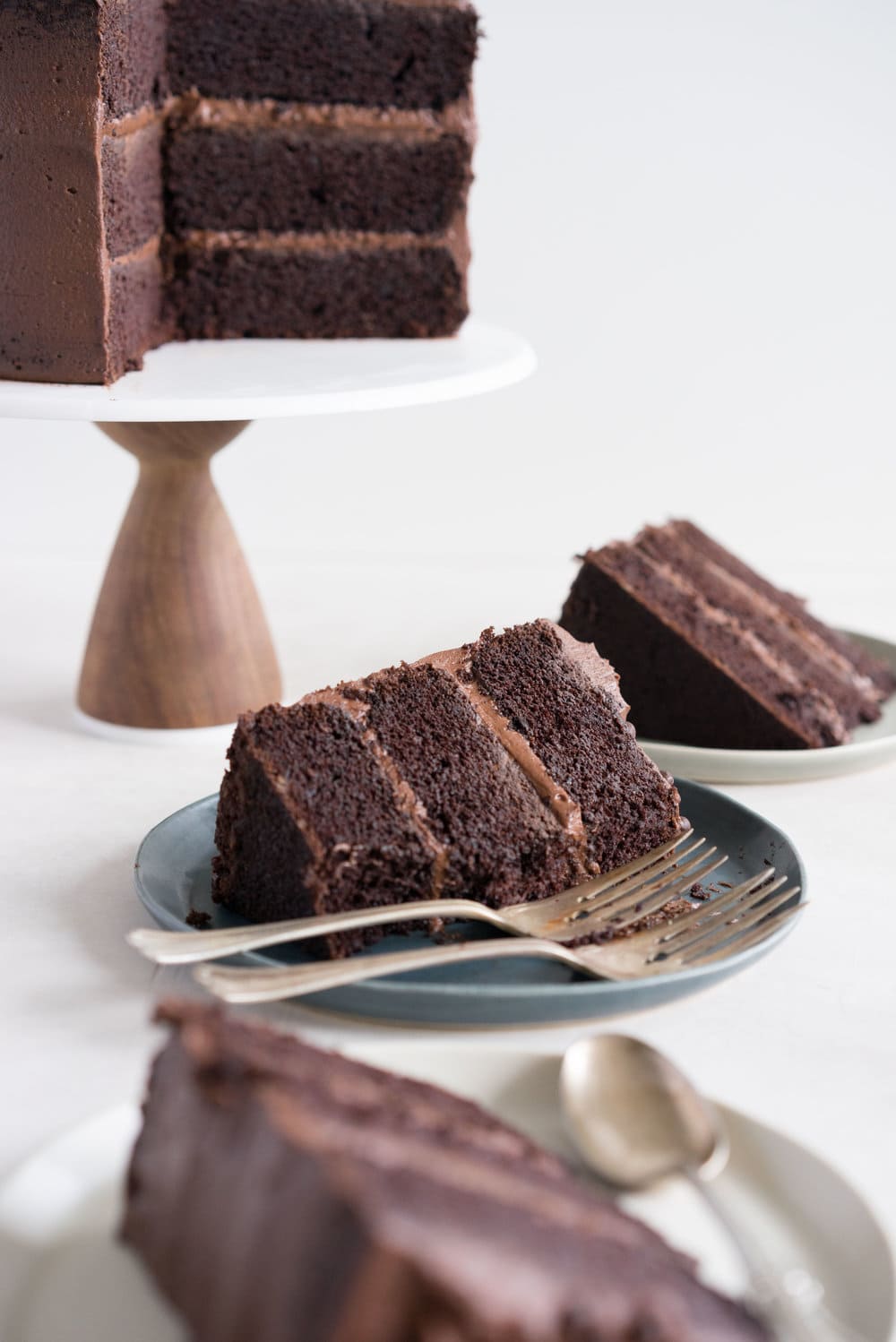 One Bowl Devil's food Layer Cake with Milk Chocolate Frosting - from the new Bravetart book! Dark chocolate cake is prepared in one bowl, baked into perfect layers, then frosted with a smooth, creamy milk chocolate frosting. The ultimate chocolate lover's cake. #devilsfood #layercake #chocolatecake #bravetart #milkchocolate