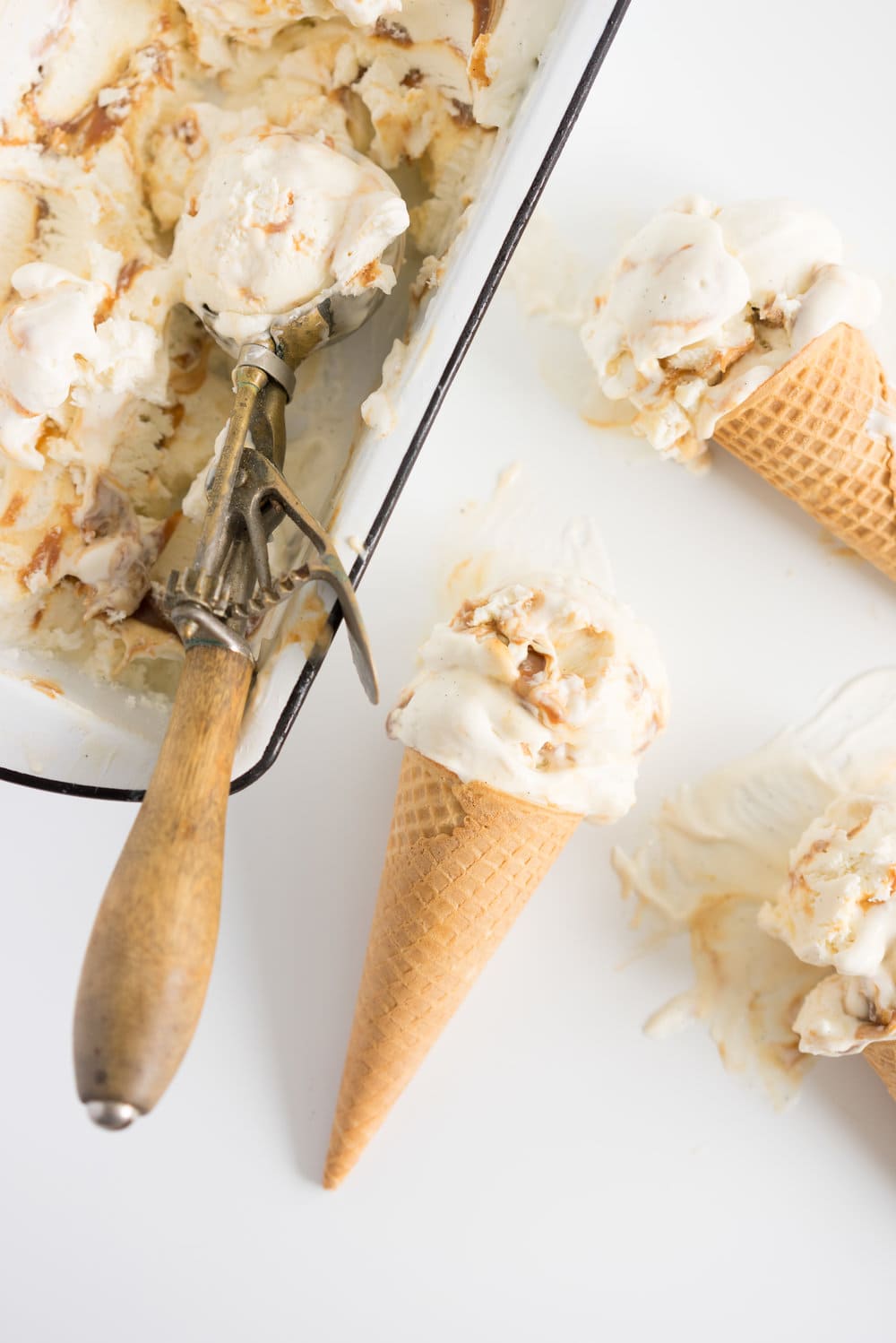 Salted Caramel No churn Ice Cream - creamy vanilla no churn ice cream is swirled with a spiced salted caramel ripple. A fancy wee twist on everyone's favourite no-churn recipe #nochurn #icecream #saltedcaramel #caramel #vanilla #nochurn