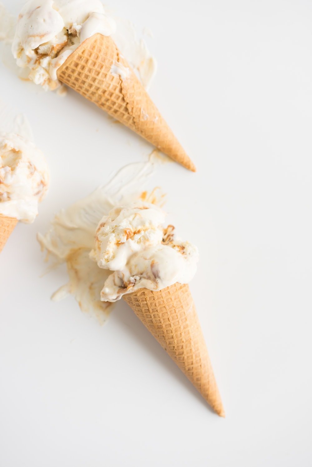 Salted Caramel No churn Ice Cream - creamy vanilla no churn ice cream is swirled with a spiced salted caramel ripple. A fancy wee twist on everyone's favourite no-churn recipe #nochurn #icecream #saltedcaramel #caramel #vanilla #nochurn