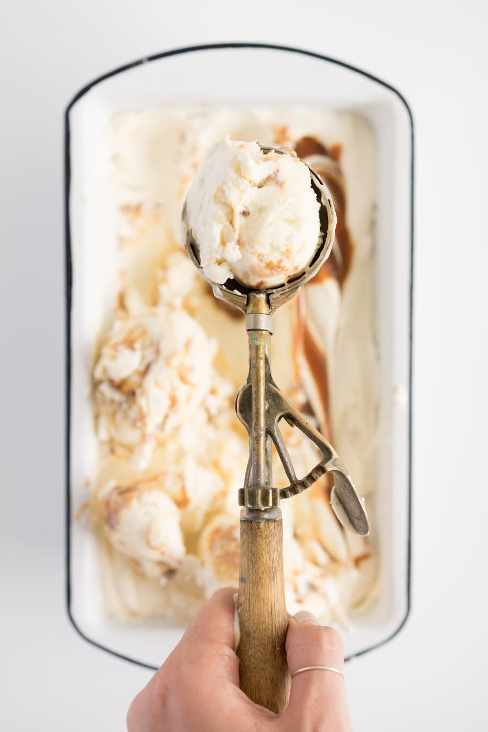 Salted Caramel No churn Ice Cream - creamy vanilla no churn ice cream is swirled with a spiced salted caramel ripple. A fancy wee twist on everyone's favourite no-churn recipe #nochurn #icecream #saltedcaramel #caramel #vanilla #nochurn
