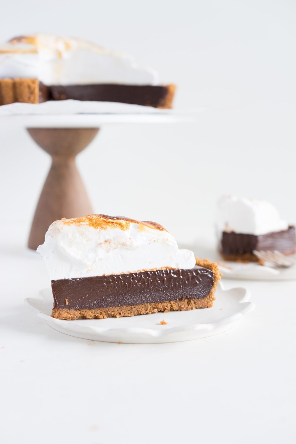 S'mores tart - brown butter graham cracker crust, silky chocolate ganache filling, and toasty vanilla bean marshmallow. #tart #chocolatetart #s'morestart #grahamcracker #smorestart #brownbutter #chocolateganache