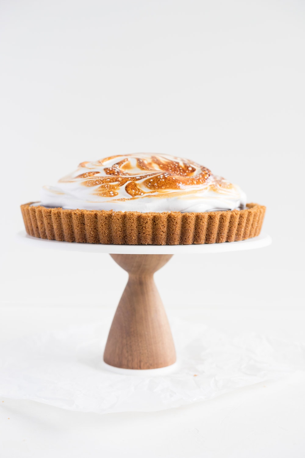 S'mores tart - brown butter graham cracker crust, silky chocolate ganache filling, and toasty vanilla bean marshmallow. #tart #chocolatetart #s'morestart #grahamcracker #smorestart #brownbutter #chocolateganache