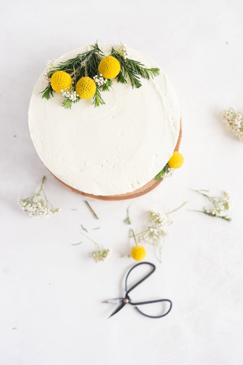 Earl Grey Cake with Raspberry Filling and Vanilla German Buttercream - A delicate earl grey infused cake, filled with a tart raspberry filling, and finished with a creamy vanilla bean german buttercream