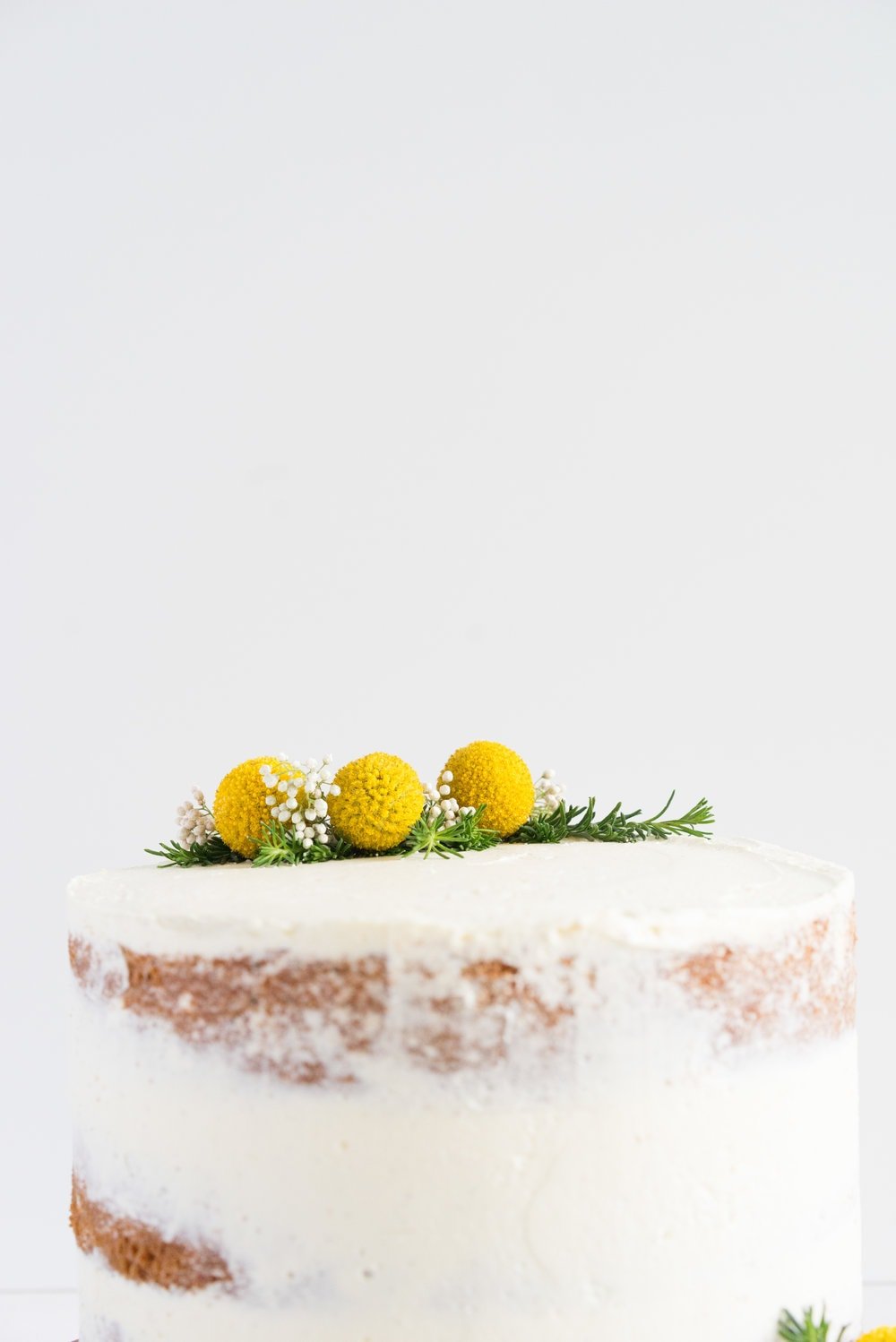 Earl Grey Cake with Raspberry Filling and Vanilla German Buttercream - A delicate earl grey infused cake, filled with a tart raspberry filling, and finished with a creamy vanilla bean german buttercream