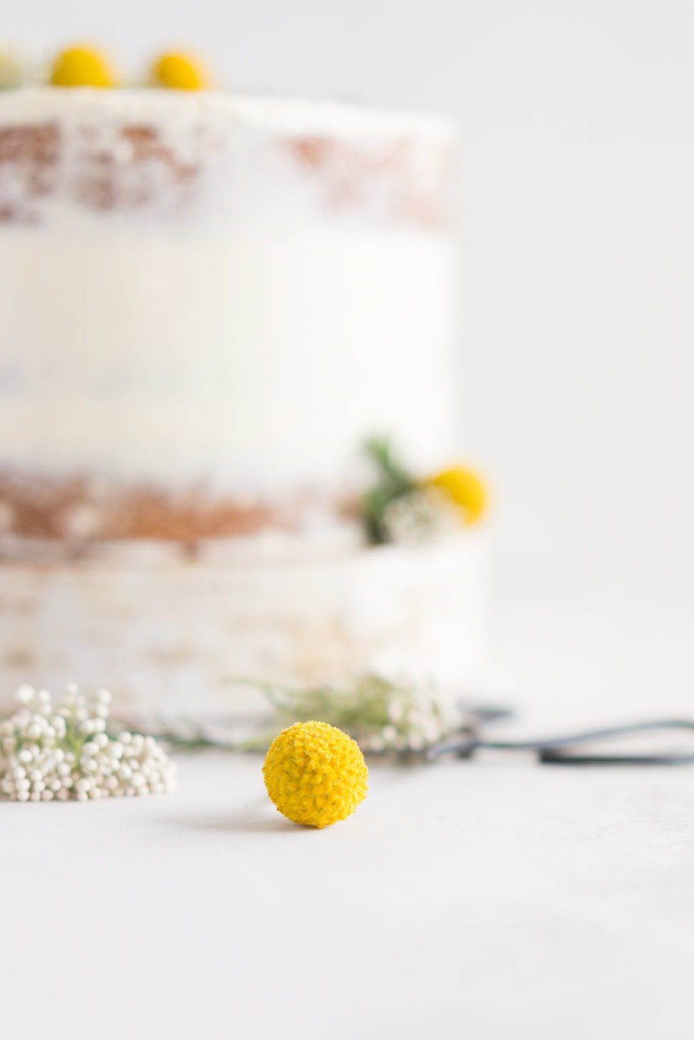 Earl Grey Cake with Raspberry Filling and Vanilla German Buttercream - A delicate earl grey infused cake, filled with a tart raspberry filling, and finished with a creamy vanilla bean german buttercream