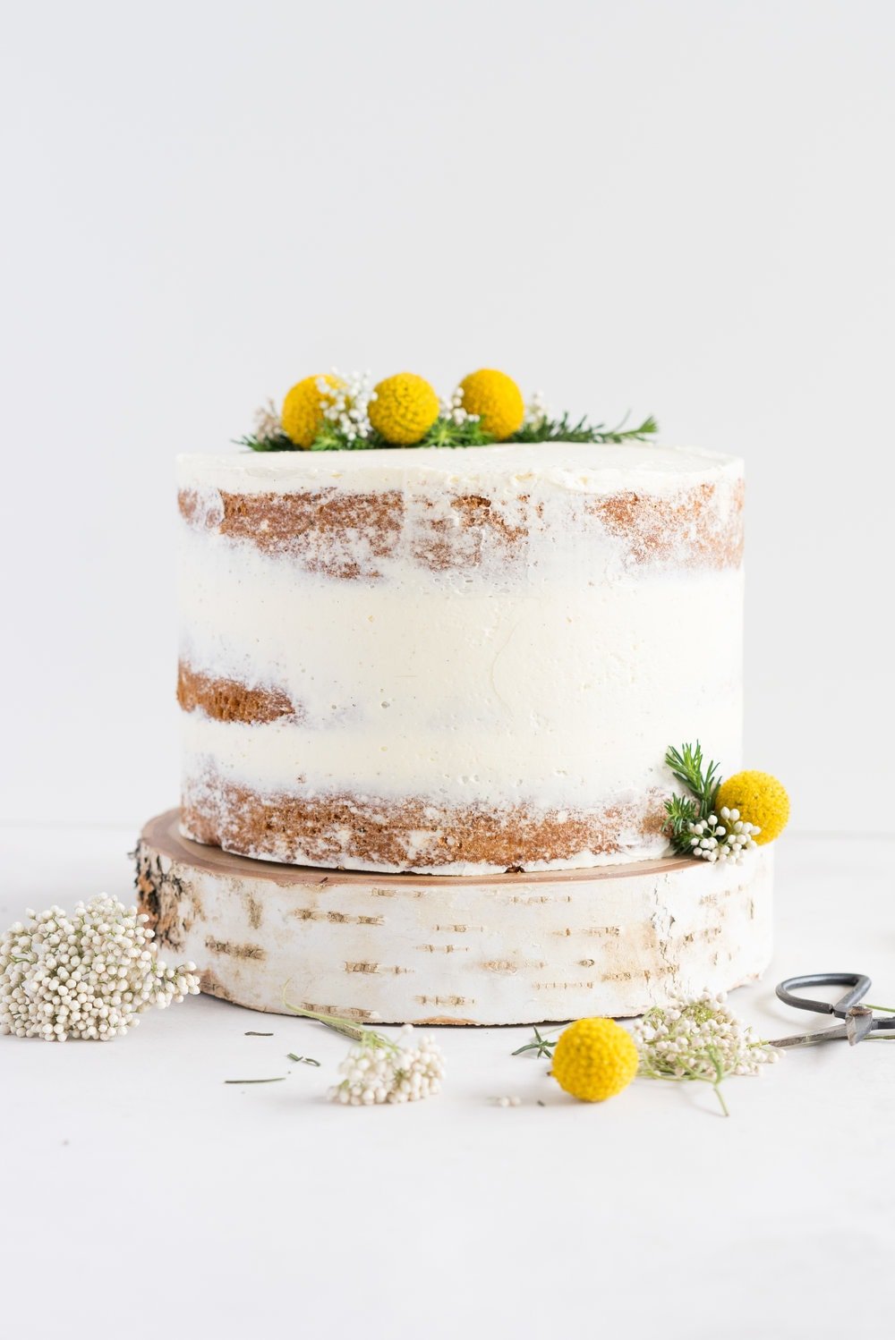 Earl Grey Cake with Raspberry Filling and Vanilla German Buttercream - A delicate earl grey infused cake, filled with a tart raspberry filling, and finished with a creamy vanilla bean german buttercream